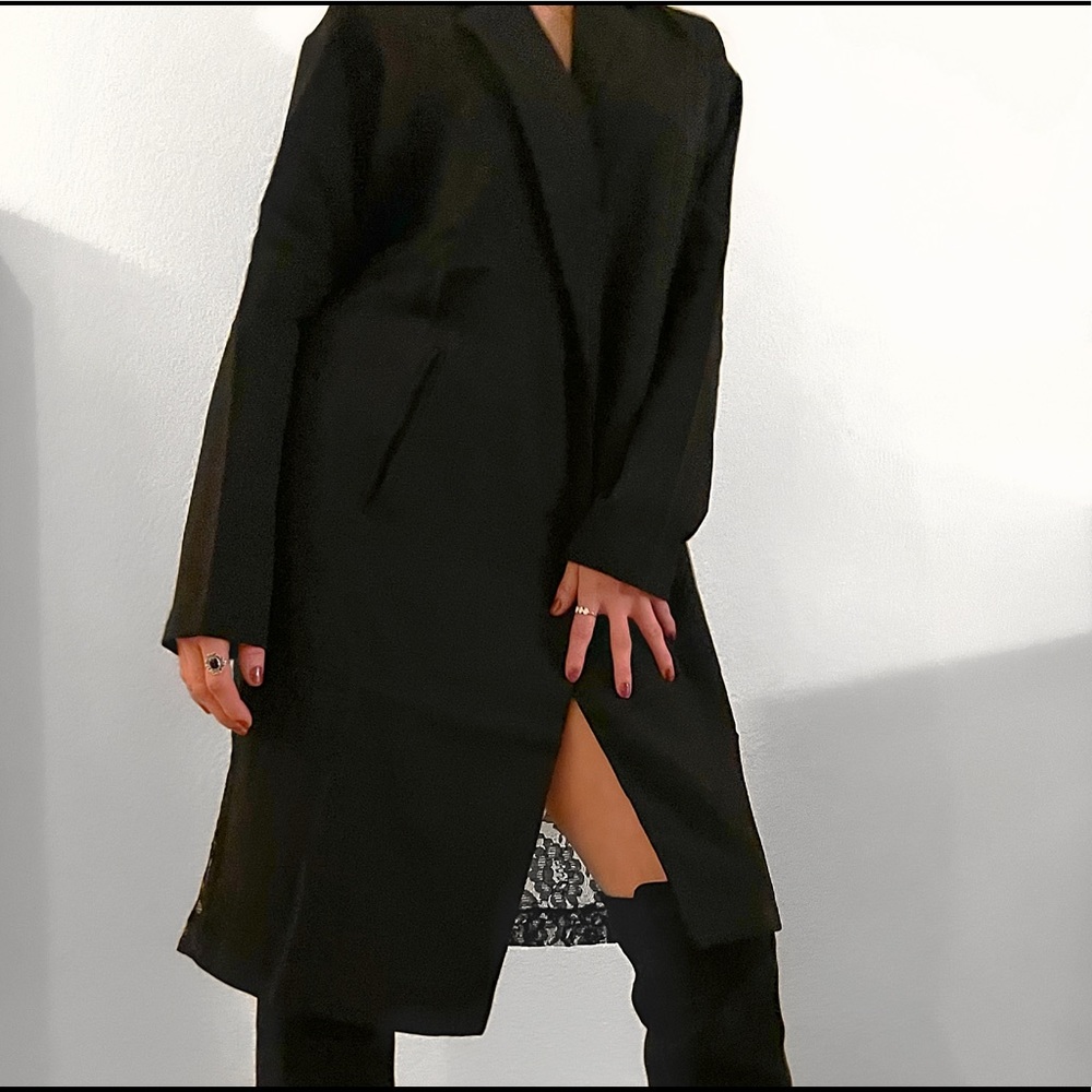 Coat with laced back